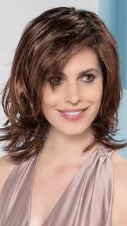 This style features an extended lace front, monofilament part, wefted sides and back