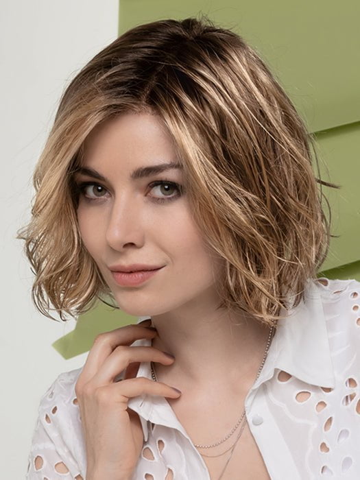 Nola has all the elements of a classic bob with beachy waves
