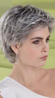 The extended lace front and monofilament crown create a natural look