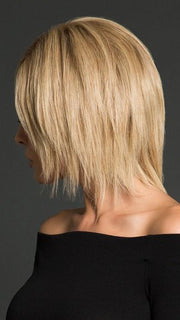 Un-cut and styled straight with a flat iron