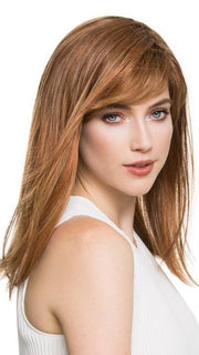Featuring a full feathered bang and textured ends 