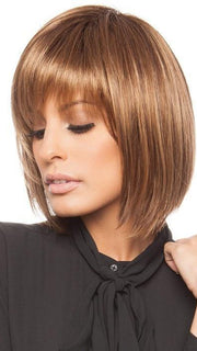 A short, trendy, and softly angled cut wig