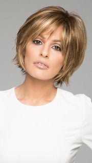 The monofilament part is on the left and hand-tied to give the look of your own hair growth 