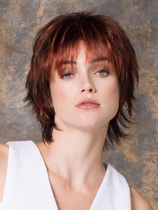 Modern cut with bangs and fashion forward colors 