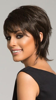 Soft bang and fringe frame the face 