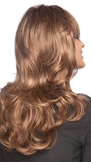 Smoothness at the root transitions to loose curls at the ends