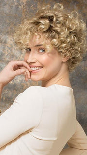 The ringlet curls can be worn polished and tight or can be combed out to loosen the curl
