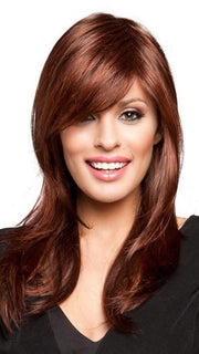 A long and layered style with a side bang and face-framing layers