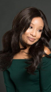 The 100% Hand-tied cap allows natural movement (This piece has been styled and curled)