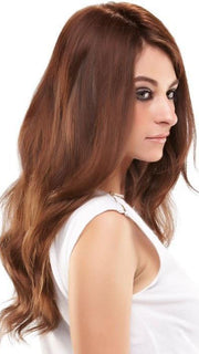The base is hand-knotted to create the appearance of natural hair growth