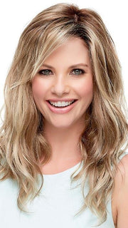 Wear the bangs off to the side or have them trimmed by your stylist