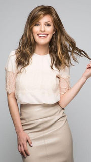 Soft silky synthetic fiber with wavy layers