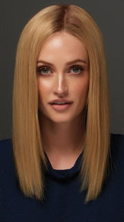 Styled with a center part and flat ironed straight 