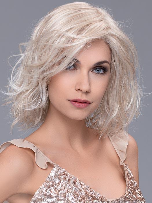A shoulder-length style with loose beach curls and an undetectable extended lace front hairline-ADDITIONAL STYLING NECESSARY TO ACHIEVE THIS LOOK
