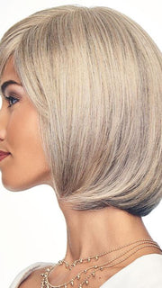 The razor tapered bangs that can be styled forward, or off the face