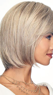 A beautiful lace front wig with a hand-knotted top for varied styling options and a life-like hairline