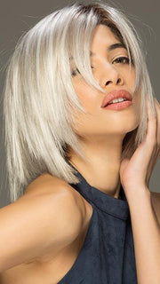 A blunt cut bob with wispy bangs