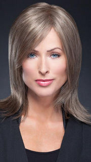 Wispy bangs and youthful, smooth, light layers that fall gently to the shoulder