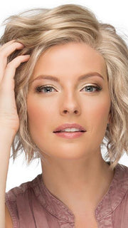 Texturized waves are paired with choppy layers for an edgy, chic look