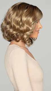 Side sweep of loose curls