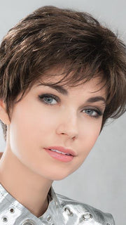 Designed to offer fullness on the top crown area and slightly longer bangs that frame the face nicely