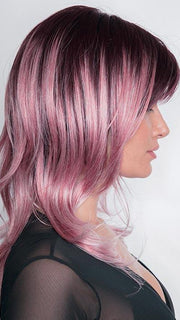 A long-layered tousled style with layered bangs that will have you looking beautiful.
