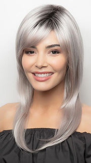 Light layering through the crown and sides give this style a feminine finish