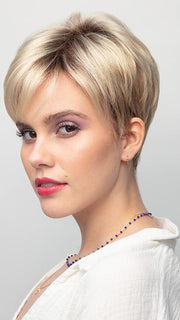 A straight pixie-cut style with side swept bangs and a tapered nape