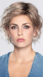 You'll love the longer front fringe and the impeccable extended lace front that allows styling versatility
