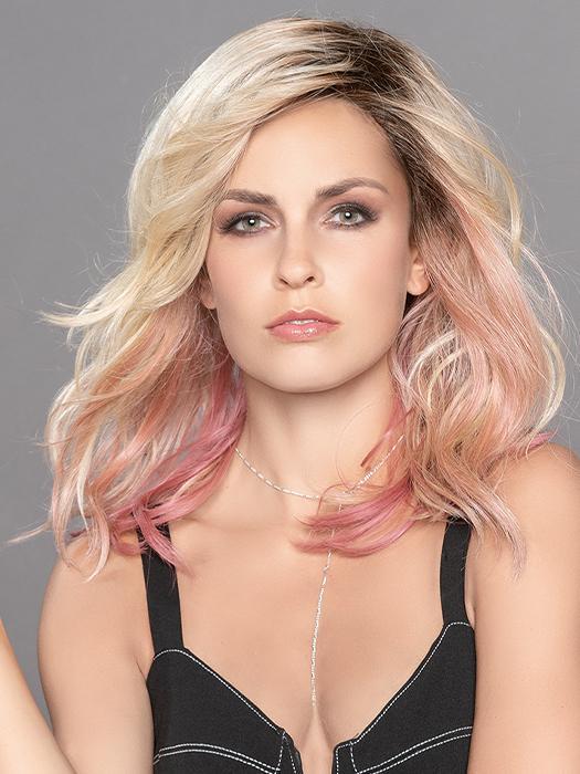 TABU by ELLEN WILLE in ROSE BLONDE ROOTED | Medium Dark Brown Roots that melt into a Pale Golden Blonde with a Mixture of Pink Tones Underneath with Darker Roots
