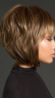 It has shaggy layers in the back, longer pieces in the front and a wispy bang