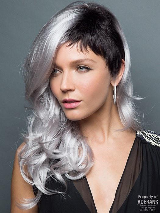 Long, loose  waves accentuated by a short, chic cut on left side. | Color: Illumina-R Violet Silver with Dark Roots.