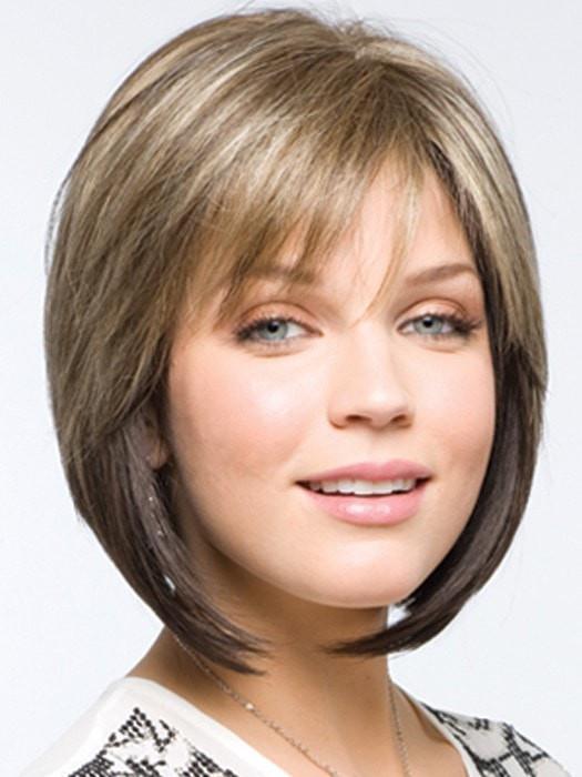 A swingy chin length angled bob with side swept fringe creates a simply beautiful look