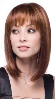 A blunt fringe combined with a double-layer monofilament cap construction