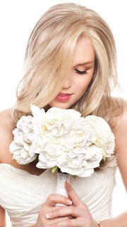 The Sheer Indulgence Monofilament top and Lace Front create a natural hairline and part