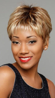 A wispy bang, textured layering on top with length at the crown and layered ends